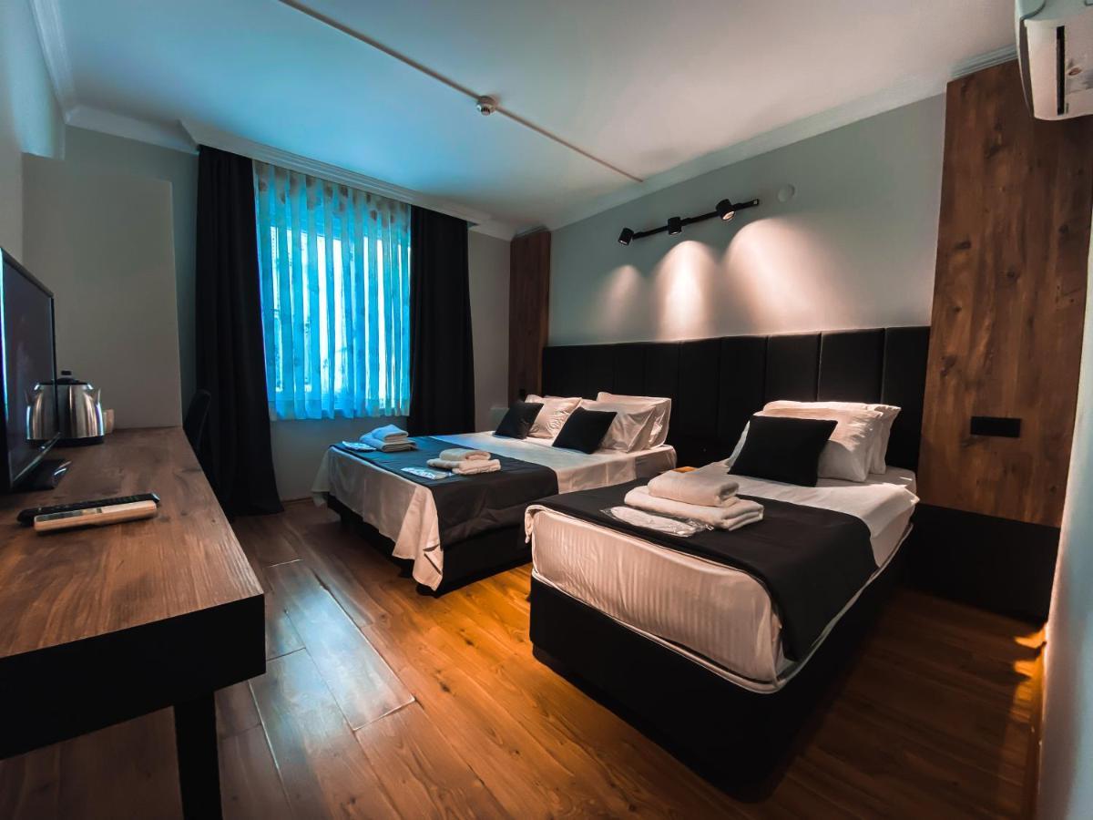 Chambre Triple - Vue sur Ville
